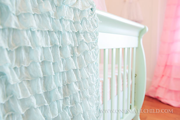Pretty aqua ruffle crib blanket | See the entire nursery at One Small Child: www.onesmallchild.com