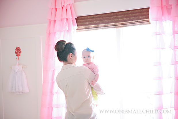 Pink ruffle curtains - perfection! | See the entire nursery at One Small Child: www.onesmallchild.com