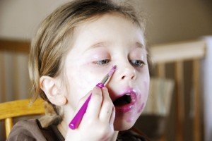 Little Girl Playing with Makeup - One Small Child