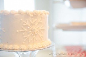 Snowflake Cross Christening CakeWinter Christening Ideas - One Small Child