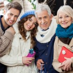 Happy Loving Family Standing In Christmas Store - One Small Child